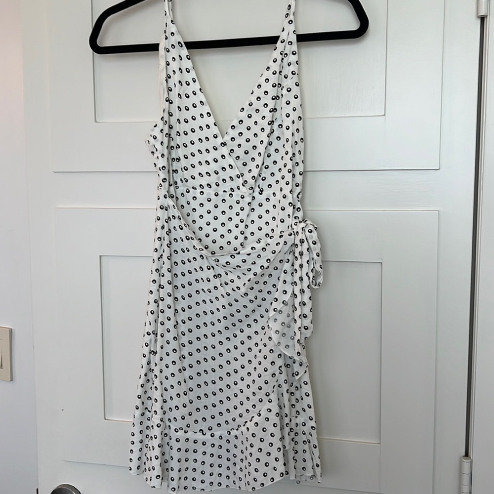 in the beginning white with black polka dots dress